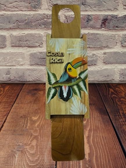 Tapanti store.ChorreadorCosta Rican handcrafted foldable wooden pour-over coffee maker.Includes a reusable cloth filter.Embedded Toucan wooden hand painted design.Light Cedar.Perfect for travel