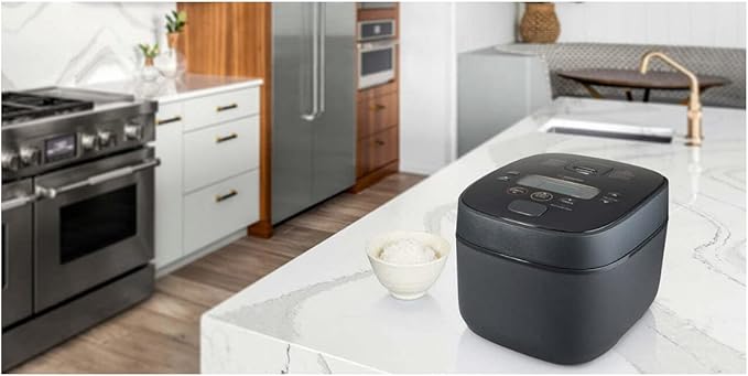 Zojirushi NW-QAC10 5.5-Cup Capacity Flat-Top Induction Cooker and Warmer with Custom Cooking Pan Double Non-Stick Coating for Easy Clean-Up (Black)