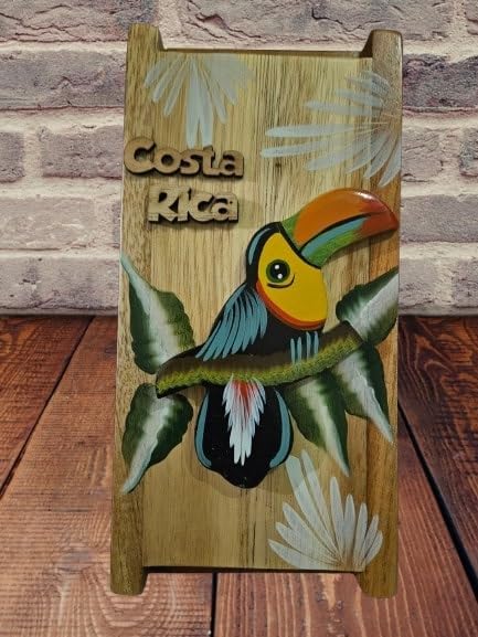 Tapanti store.ChorreadorCosta Rican handcrafted foldable wooden pour-over coffee maker.Includes a reusable cloth filter.Embedded Toucan wooden hand painted design.Light Cedar.Perfect for travel