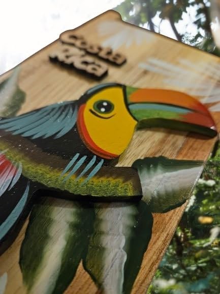 Tapanti store.ChorreadorCosta Rican handcrafted foldable wooden pour-over coffee maker.Includes a reusable cloth filter.Embedded Toucan wooden hand painted design.Light Cedar.Perfect for travel