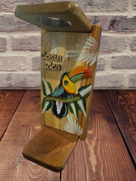 Tapanti store.ChorreadorCosta Rican handcrafted foldable wooden pour-over coffee maker.Includes a reusable cloth filter.Embedded Toucan wooden hand painted design.Light Cedar.Perfect for travel