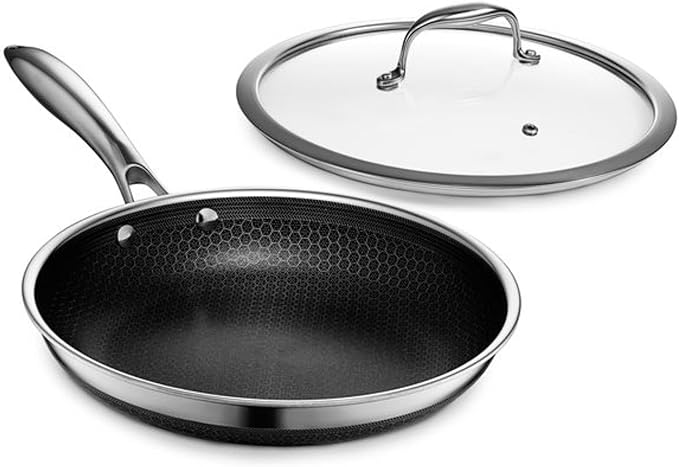 HexClad Hybrid Nonstick 7-Piece Cookware Set 10 Pan with Lid 10 Wok 8Qt Stockpot with Lid and Salt and Pepper Grinder Set