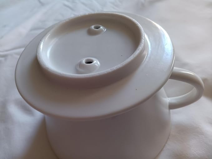 flat-bottom ceramic pour-over coffee dripper.