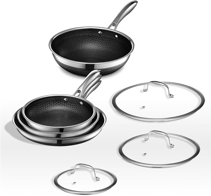 HexClad Hybrid Nonstick 7-Piece Cookware Set 8 10 and 12 Pans with Lids and 10 Wok Stay-Cool Handles Dishwasher and Oven-Safe Induction Ready Compatible with All Cooktops