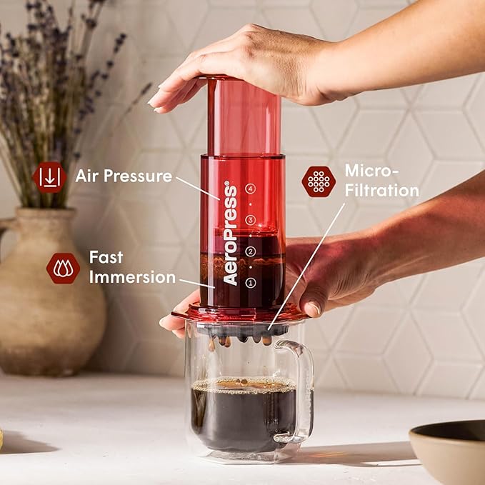 AeroPress Clear Red Coffee Press - All-in-One French Press Pour-Over &amp Espresso Style Manual Brewer 2 Min Brew for Less Bitterness More Flavor Small Portable Coffee Maker Travel &amp Camping
