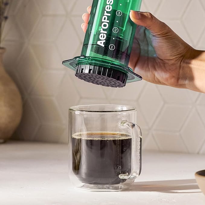 AeroPress Clear Green Coffee Press - All-in-One French Press Pour-Over &amp Espresso Style Manual Brewer 2 Min Brew for Less Bitterness More Flavor Small Portable Coffee Maker Travel &amp Campi