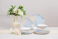High Bone China Dinnerware Set 12-Piece Artistic Blue Plates and Bowls Lightweight &amp Chip Resistant Ceramic Service for 4 Dishwasher Safe Elegant Kitchen Dining