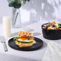 18‑Piece Stoneware Dinnerware Set in Matte White Modern Plates and Bowls for Everyday Meals and Special Occasions Dishwasher &amp Microwave Safe (Black)