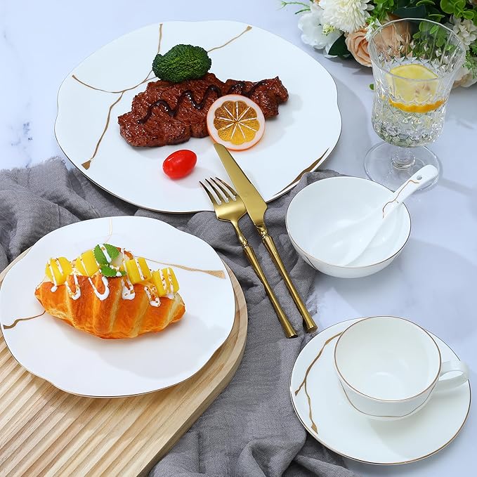 24 Piece White Porcelain Dinnerware set for 4Plates and Bowls Sets With Gold Rim and gold accentsHighly Chip and Crack Resistant | Dishwasher Safe Dishes Set