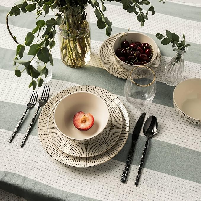 12-Piece Ceramic Dinnerware Set Plates and Bowls Service for 4 Microwave &amp Dishwasher Safe Complete Set: Includes 4 dinner plates 4 salad plates and 4 bowls Black/White